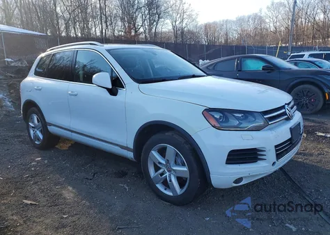 2013 Volkswagen Touareg V6 Tdi z USA, uszkodzony, nr VIN WVGEP9BP5DD005334